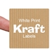 A close-up of a square kraft paper label with white text reading White Print Kraft Labels, held between fingers. The custom label has a subtle striped brown texture and rounded corners, showing its compact size and natural paper look.