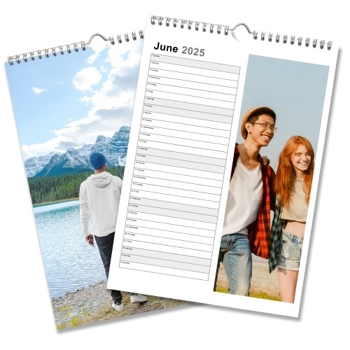 Two A4 wall calendars for June 2025. One side shows a landscape image of a person standing by a lake with mountains in the background, while the other side features a lined notes section and a photo of two people smiling outdoors. Both have spiral bindings and hanging hooks.