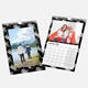 Two A4 wall calendars with black floral borders. One features a scenic landscape of a couple by a lake and mountains, while the other shows October 2025 with a photo of three people wearing superhero costumes. Both calendars have spiral bindings and hanging hooks.