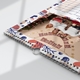 Close-up of a wire-bound personalised A3 photo calendar with an integrated hanging hook.