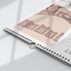 Close-up of a personalised A3 list calendar showing its wire binding and integrated hanging hook.