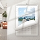 An A4 photo calendar on a wall opened to June. The photo Can be any image of your choice. The calendar is spiral-bound with a blank monthly grid for June. A modern living room is visible in the background.