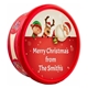 Red tub with a personalised Christmas sticker featuring Santa, a reindeer, and an elf peeking over the top. The message reads 