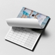 Personalised A3 family photo calendar with wire binding and a page turning above the monthly grid.