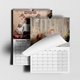 wo personalised A3 family photo calendars with a curled page revealing the 2027 monthly grid.