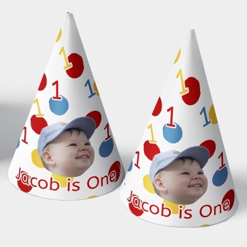 Two customised party hats with a white background, personalised with your photo and number of your choice. The hats are displayed upright side by side. Perfect for birthdays or celebrations.