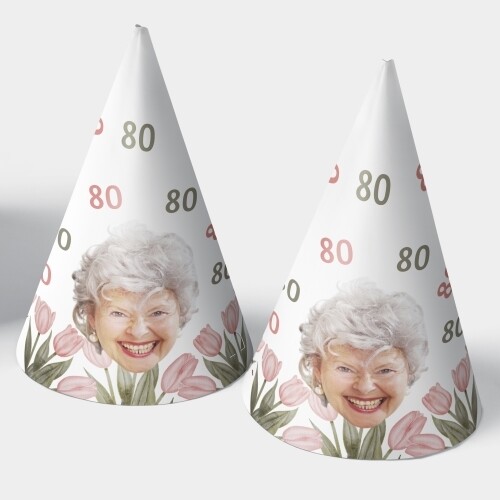 Two customised party hats with a white background, personalised with your photo and number of your choice. The hats are displayed upright side by side. Perfect for birthdays or celebrations.