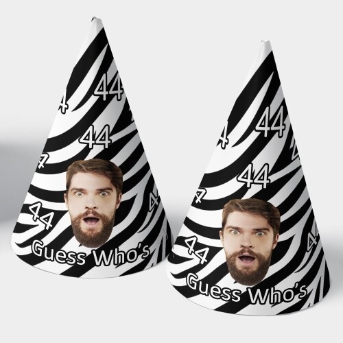 Two customised party hats with a white background, personalised with your photo and number of your choice. The hats are displayed upright side by side. Perfect for birthdays or celebrations.