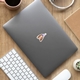 Personalised vinyl face sticker featuring a smiling woman in a purple party hat with the number 30, applied to a grey laptop. The sticker adds a fun, customised touch to tech accessories, ideal for birthdays, hen parties or gifts.
