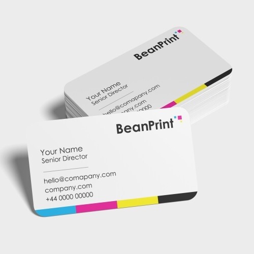 Stack of rounded business cards with front card displayed showing modern typography and colour strip detail.