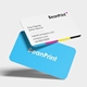 Floating rounded business cards mockup showing blue reverse side and white front with contact details
