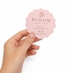 hand holding custom shaped business card