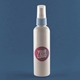 A white spray bottle with a blue nozzle features a round, personalised sticker with a pink gradient background and the words 