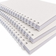 white note book with spiral bound
