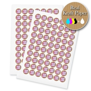 Two sheets of kraft circle label stickers with a custom pink and white logo, made from real kraft paper. The sheets display multiple eco-friendly labels, ideal for personalised branding or packaging.